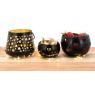 Black and gold candle holder with hearts