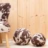 Pouf rond imitation vache.